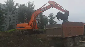 Экскаватор полноповоротный колесный Doosan 180 погрузка грунта